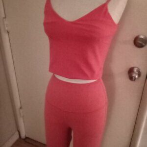 Sports top and shorts. Peach color.